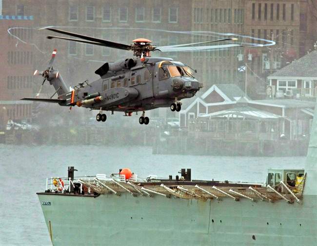 A Canadian military Sikorsky CH-148 Cyclone conducts test flights with HMCS Montreal in Halifax harbour on April 1, 2010. (Andrew Vaughan/The Canadian Press)