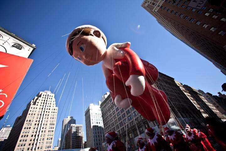 The Elf on a Shelf balloon floats above the street during the Macy’s Thanksgiving Day Parade on November 28, 2013 in New York City. (Photo by Kena Betancur/Getty Images)