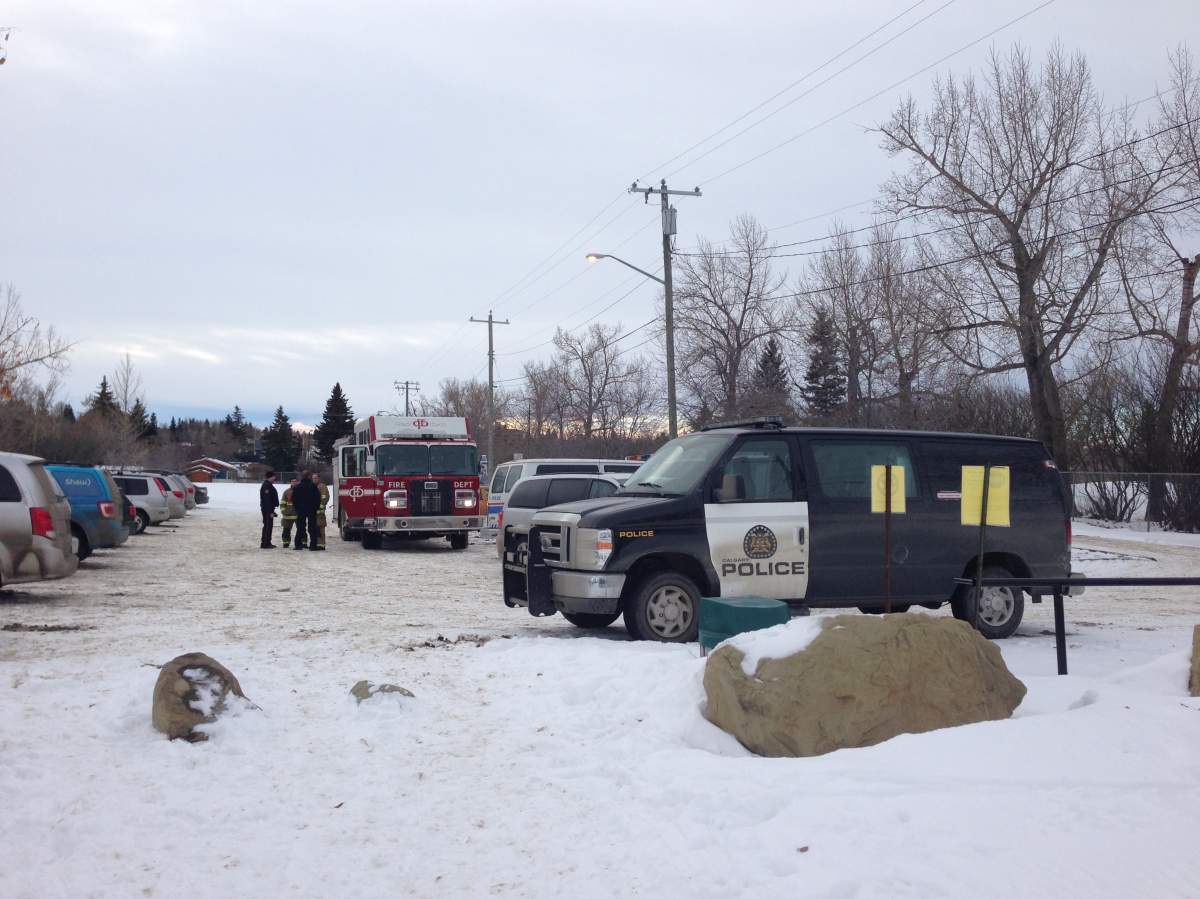 Police discover a dead body at a makshift homeless camp near the Shaganappi Point Golf Course on Saturday.