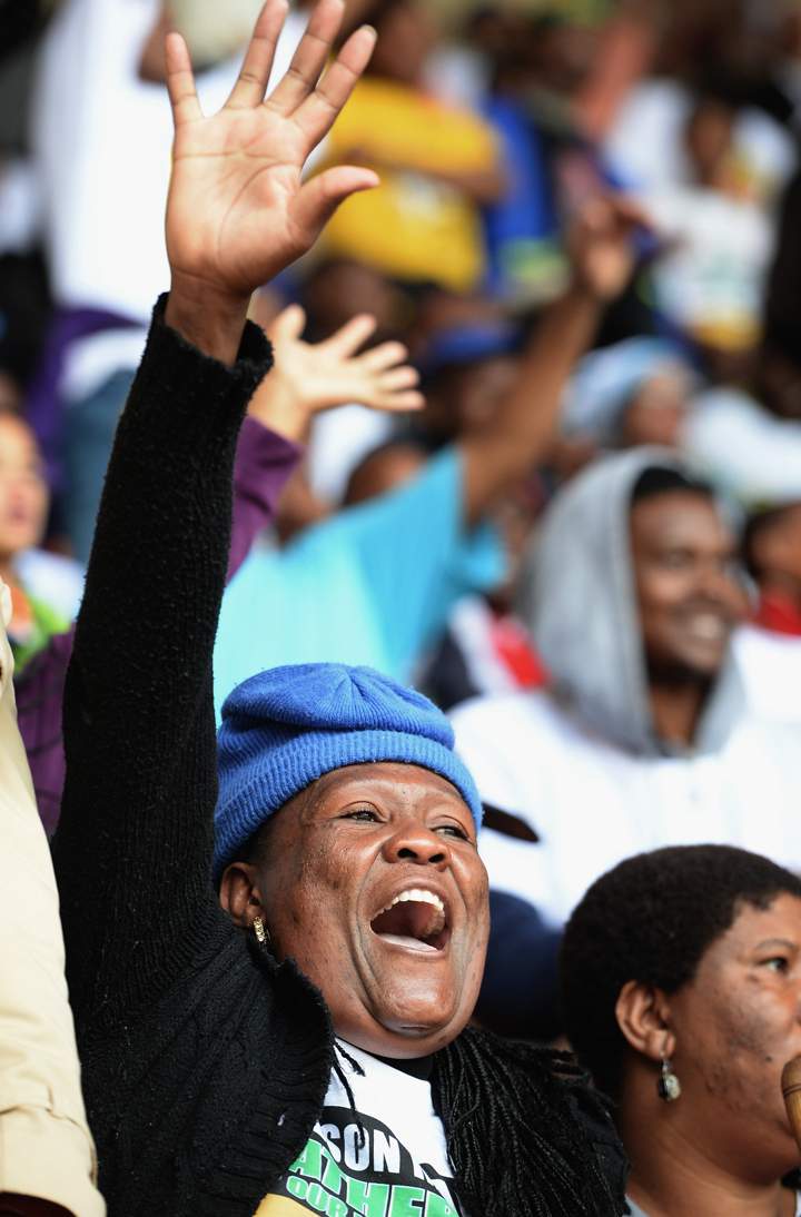 Members of the public attend the Nelson Mandela memorial service at the FNB Stadium, on Dec. 10, 2013 in Johannesburg, South Africa. (Photo credit: Getty Images)