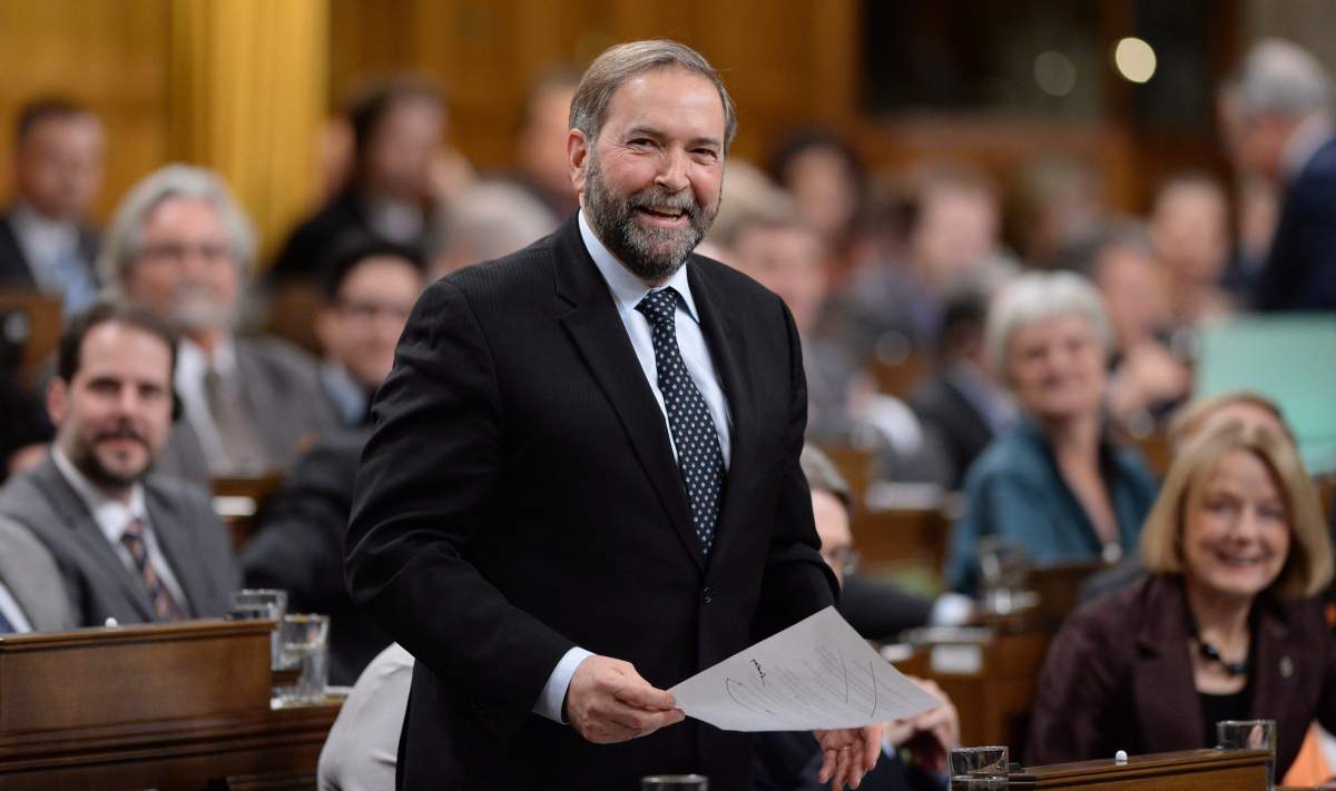 NDP leader Thomas Mulcair responds to a question during Question Period in the House of Commons on Parliament Hill in Ottawa on Wednesday, December 4, 2013. THE CANADIAN PRESS/Sean Kilpatrick