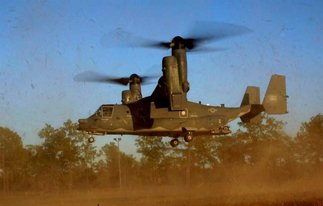 In this photo taken Jan. 26, 2011 and released by the U.S. Air Force, a CV-22 Osprey aircraft of the 8th Special Operations Squadron (SOS) "Black Birds" comes in for a landing during a local training mission at Hurlburt Field, Florida, USA. Gunfire hit three U.S. military CV-22 Osprey aircraft Saturday, Dec. 21, 2013 trying to evacuate American citizens in Bor, the capital of the remote region of Jonglei state in South Sudan, that on Saturday became a battle ground between South Sudan's military and renegade troops, officials said, with four U.S. service members wounded in the attack.
