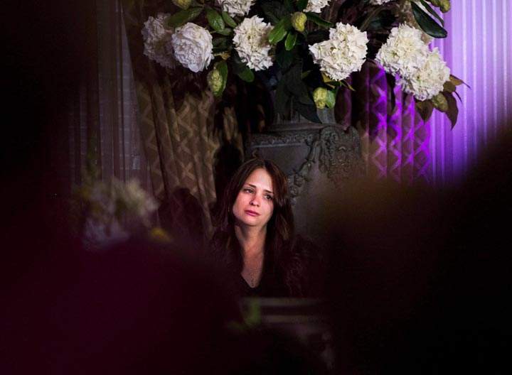 Widow Sharlene Bosma cries at a memorial in Hamilton, Ont., for her husband Tim Bosma, the Hamilton man found dead after he took two men on a test drive. (The Canadian Press /Nathan Denette)