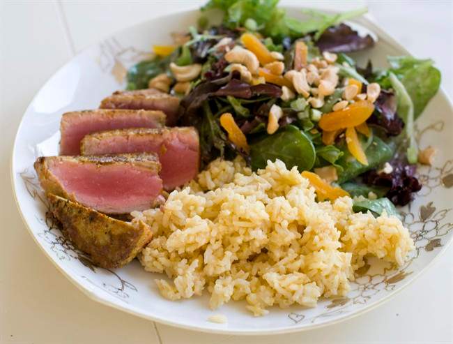Recipes for coconut cashew salad, seared curry-rubbed tuna, tangerine twirls