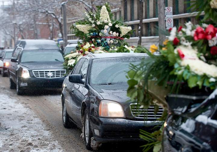 The funeral cortege of Nicolo Rizzuto Jr., leaves Notre Dame de la Defense church in Little Italy, Montreal, Saturday, Jan., 02, 2010 following his funeral.