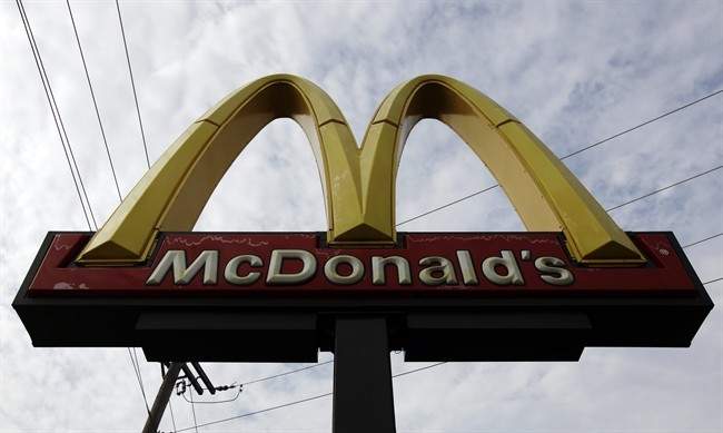 FILE - In this Friday, Oct. 4, 2013, file photo, a McDonald's restaurant sign is seen.