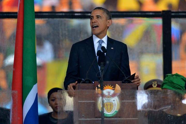 U.S. President Barack Obama delivers a speech during the memorial service for late South African President Nelson Mandela in Johannesburg on December 10, 2013.