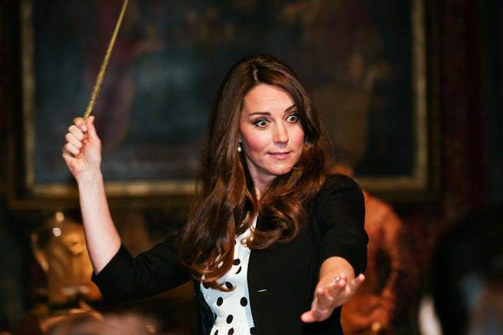 Catherine, Duchess of Cambridge, tries a wand during the Harry Potter Tour at the Inauguration Of Warner Bros Studios in Leavesden, north London.  (Paul Rogers/AFP/Getty Images)