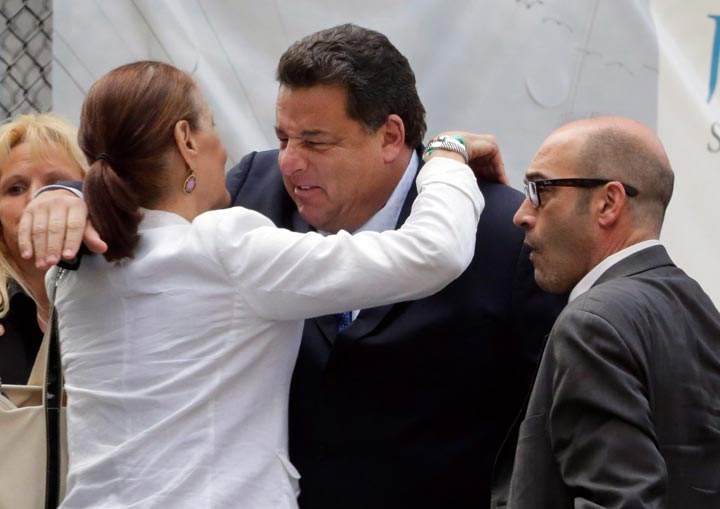 Actors Steve Schirripa, centre, and John Ventimiglia arrive for the funeral service of James Gandolfini, star of “The Sopranos,” in New York. (AP Photo/Richard Drew)
