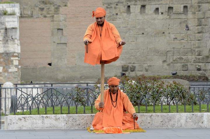Street artists perform in Rome. (Andreas Solaro/AFP/Getty Images)