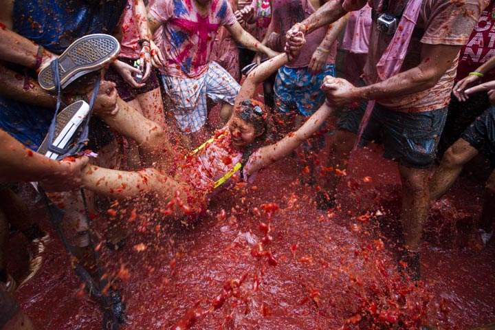 Revellers take part in the annual “Tomatina” festivities in Spain. (Gabriel Gallo/AFP/Getty Images)
