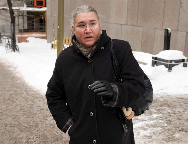 Pamela Mattock Porter leaves court after her request to have her bail conditions changed so she can spend the winter in Florida were denied, Thursday, December 19, 2013 in Montreal.