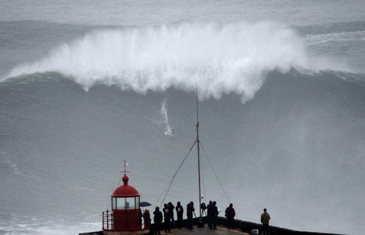 Brazilian big wave surfer Carlos Burle rides a wave in Nazare, central Portugal, on October 28, 2013. (Francisco Leong/AFP/Getty Images)