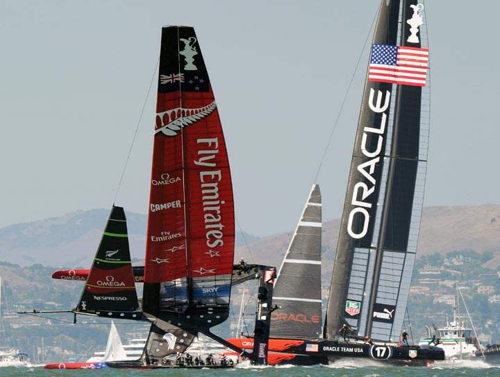 Emirates Team New Zealand (L) competes against Oracle Team USA during the 34th America’s Cup on September 14, 2013 in San Francisco. (Don Emmert/AFP/Getty Images)