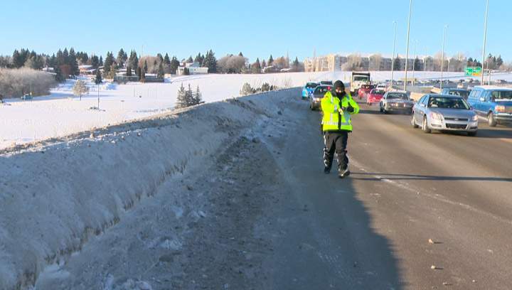 Vehicle goes over Circle Drive North Bridge into the South Saskatchewan River Monday afternoon.