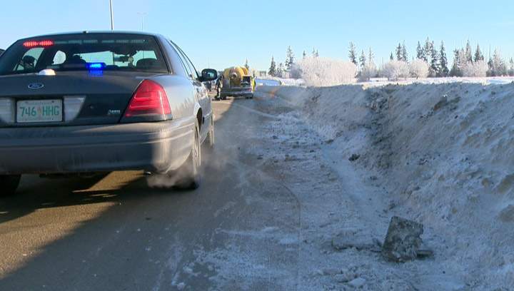 Vehicle goes over Circle Drive North Bridge into the South Saskatchewan River Monday afternoon.
