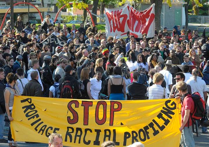 Demonstators take part in an anti-police brutality march Montreal, Saturday Oct. 11, 2008.
