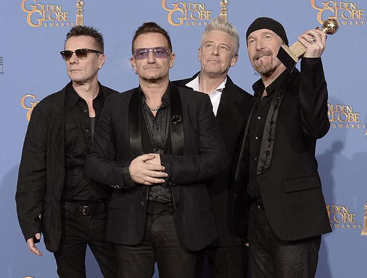 U2 backstage at the Golden Globe Awards on Jan. 12, 2014.