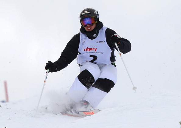 Alex Bilodeau of Canada competes during the men's moguls finals at the FIS Freestyle Ski World Cup January 4, 2014 in Calgary, Alberta, Canada.