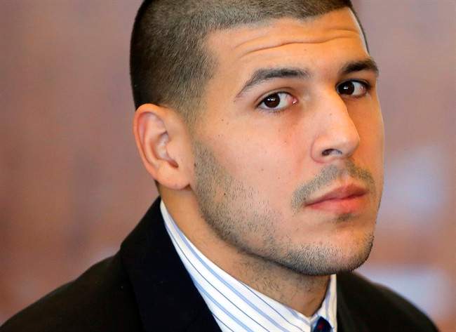 In this Oct. 9, 2013, file photo, former New England Patriots NFL football player Aaron Hernandez attends a pretrial court hearing in Fall River, Mass. 