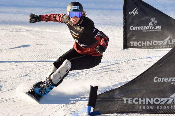 Canada's Caroline Calve clears a gate during the Snowboard FIS World Cup Parallel Slalom race on December 14, 2013. 