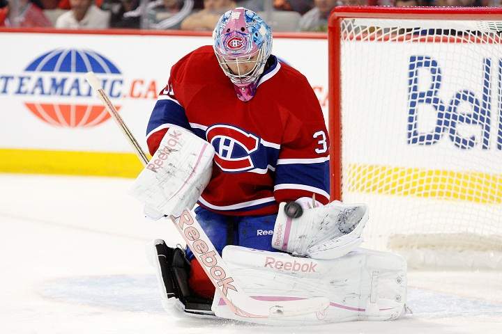 Carey Price #31 of the Montreal Canadiens stops the puck during the NHL game against the Buffalo Sabres at the Bell Centre on October 18, 2011 in Montreal.