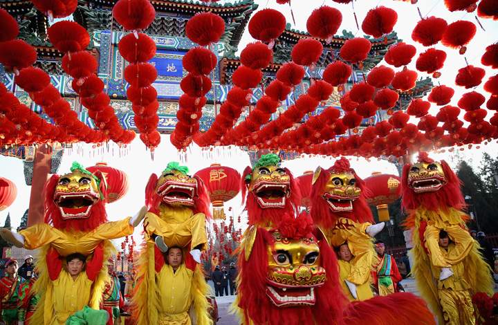 Chinese folk artists perform during the opening ceremony of the Spring Festival Temple Fair at the Temple of Earth park on Jan. 30, 2014 in Beijing, China. (Photo credit: Feng Li/Getty Images)