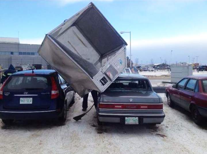 This container used for loading baggage into planes was blown over a fence and into the employee parking lot at the Saskatoon airport on Jan. 15, 2014.