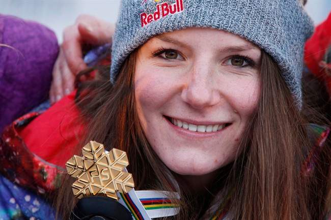 Kaya Turski from Canada shows off her gold medal after the women's slopestyle final Saturday March 9, 2013, during the ongoing Freestyle World Ski Championships at Voss, Western Norway. 