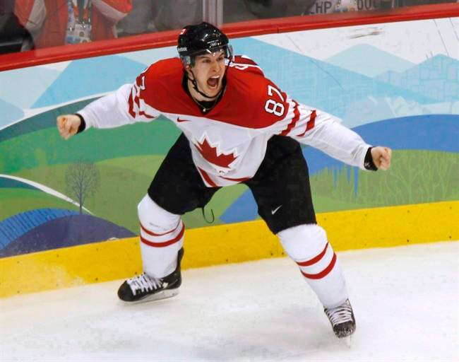 Canada's Sidney Crosby celebrates his game-winning goal against the United States at the 2010 Winter Olympic Games in Vancouver on Feb. 28, 2010. 