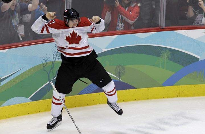 Canada’s Sidney Crosby leaps in the air after making the game-winning goal in the overtime period of a men’s gold medal ice hockey game against USA at the Vancouver 2010 Olympics in Vancouver, British Columbia.