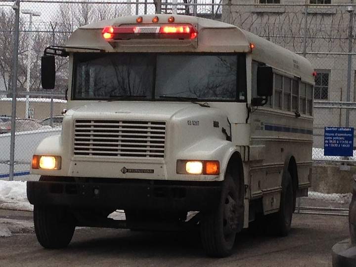 A glimpse of a prison van approaching the Joliette courthouse on January 17, 2014.