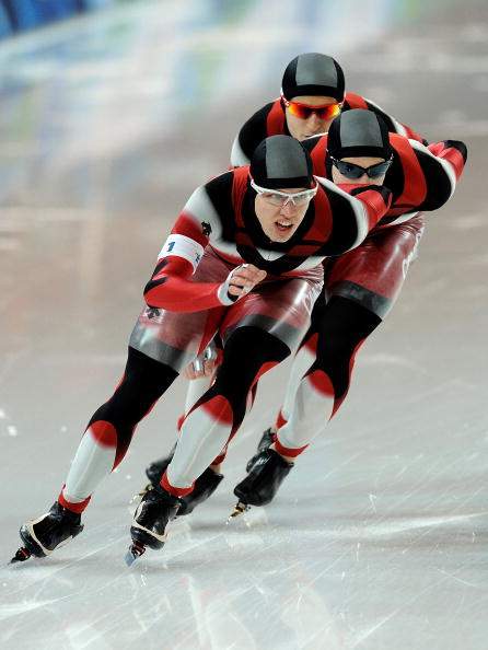 Team Canada with Mathieu Giroux, Lucas Makowsky and Denny Morrison compete on their way to winning the gold medal in the speed skating men's team pursuit finals on day 16 of the 2010 Vancouver Winter Olympics at Richmond Olympic Oval on February 27, 2010 in Vancouver.