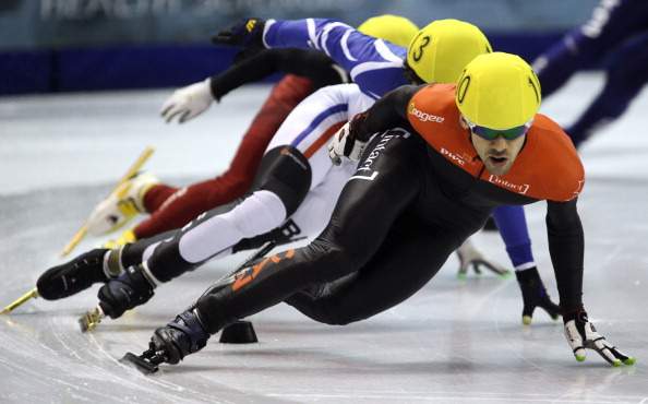 Francois Hamelin of Canada wins his heat in the men's 1000 quarter-final at the Samsung ISU short track speed skating World Cup on October 20, 2012 at the Olympic Oval in Calgary.