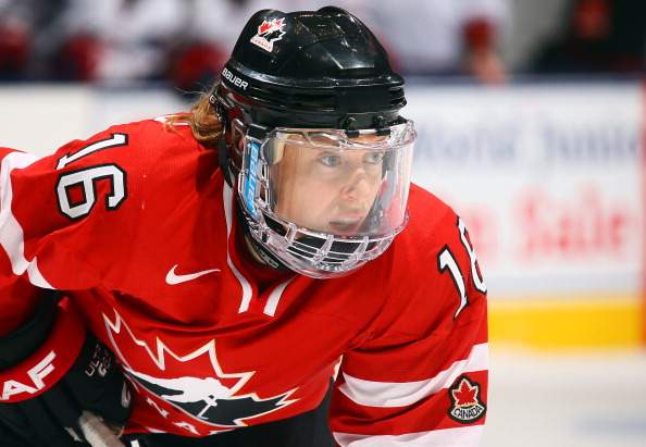 Jayna Hefford #16 of Team Canada waits for a face-off against Team USA during a Sochi preparation game at the Air Canada Centre December 30, 2013 in Toronto.
