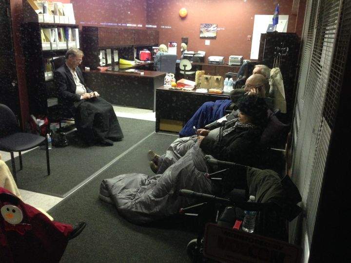 A group of seniors remained inside Health Minister Fred Horne’s constituency office Thursday, Jan. 16, 2014.