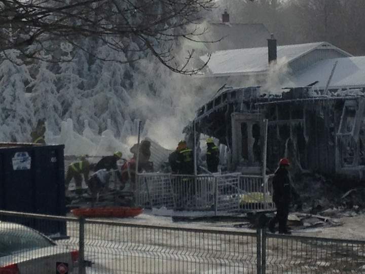 Investigators continued their grim work of sifting through the icy rubble in L'Isle Verte, Que. to try to identify more victims on Friday, January 24, 2014.