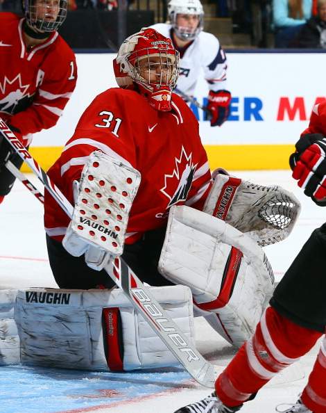Genevieve Lacasse #31 of Team Canada guards the net against Team USA during a Sochi preparation game at the Air Canada Centre December 30, 2013 in Toronto.