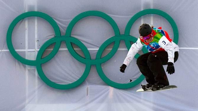 Maelle Ricker clears a jump on her way to gold in West Vancouver, B.C., on February 16, 2010. Snowboardcross was the most hazardous sport at the Winter Olympics in Vancouver, with nearly 75 per cent of female athletes sustaining injuries during the rough-and-tumble races, according to a medical study. THE CANADIAN PRESS/Sean Kilpatrick.