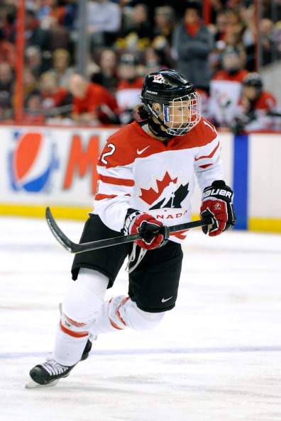  Meaghan Mikkelson #12 of Team Canada skates during the IIHF Womens World Championship Semi-Final  game against Team Russia at Scotiabank Place on April 8, 2013 in Ottawa.
