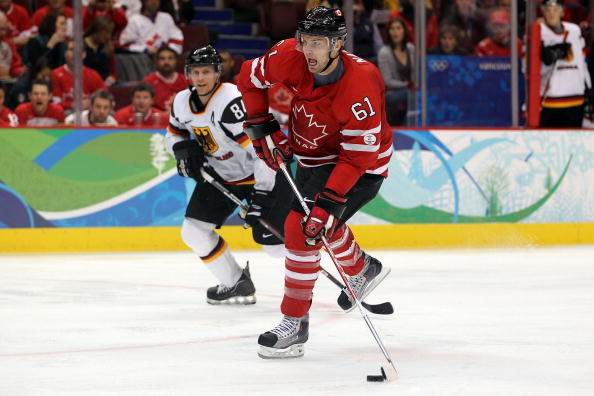 Rick Nash #61 of Canada handles the puck during the ice hockey Men's Qualification Playoff game between Germany and Canada on day 12 of the Vancouver 2010 Winter Olympics at UBC Thunderbird Arena on February 23, 2010 in Vancouver.