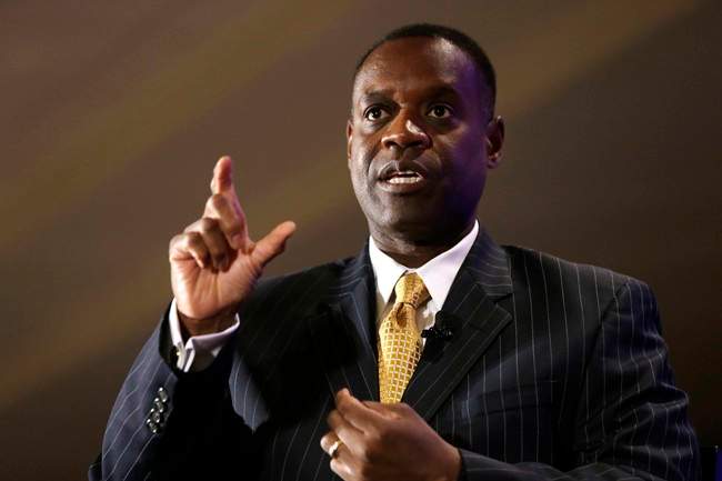 This Oct. 3, 2013, file photo shows Detroit Emergency Manager Kevyn Orr gesturing during an interview at the Detroit Economic Club luncheon in Detroit.