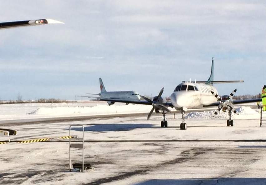 Diverted aircraft at Brandon’s airport Wednesday, Jan. 15, 2014, including an Air Canada Airbus in the background