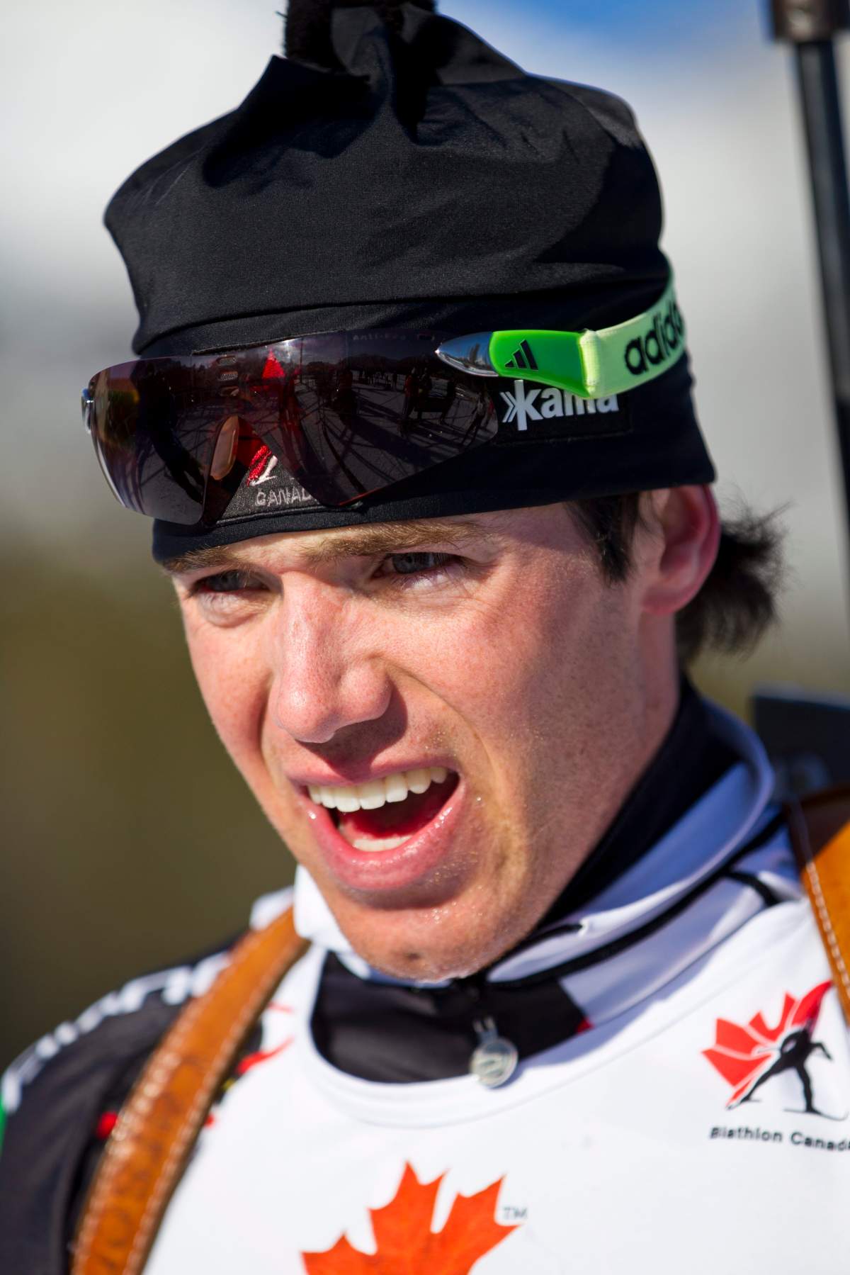 Canadian biathlon athlete Nathan Smith catches his breath after crossing the finish line at The International Biathlon Union Cup # 7 Mens 10 KM Sprint held at the Canmore Nordic Center in Canmore Alberta, Canada, on Feb 16, 2012. 