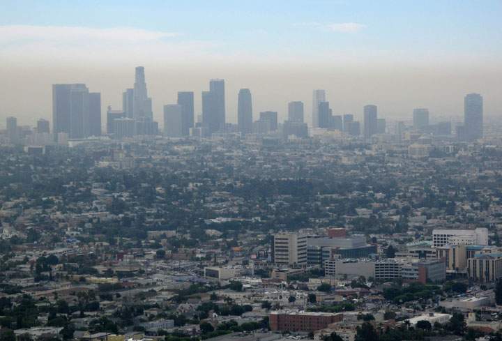 Dense smog hovers of the Los Angeles skyline in 2009. The state of California has committed itself to significantly reducing pollution levels.