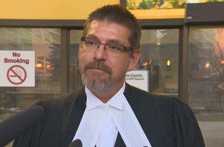 Lawyer Paul Moreau speaks to the media outside the Edmonton Law Courts Thursday, Jan. 30, 2014.