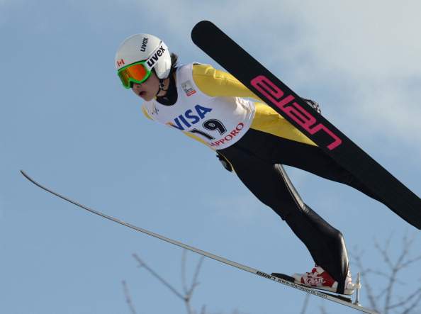 Atsuko Tanaka of Canada soars in the air during the World Cup women's ski jumping in Sapporo in Japan's northern island of Hokkaido on February 2, 2013.