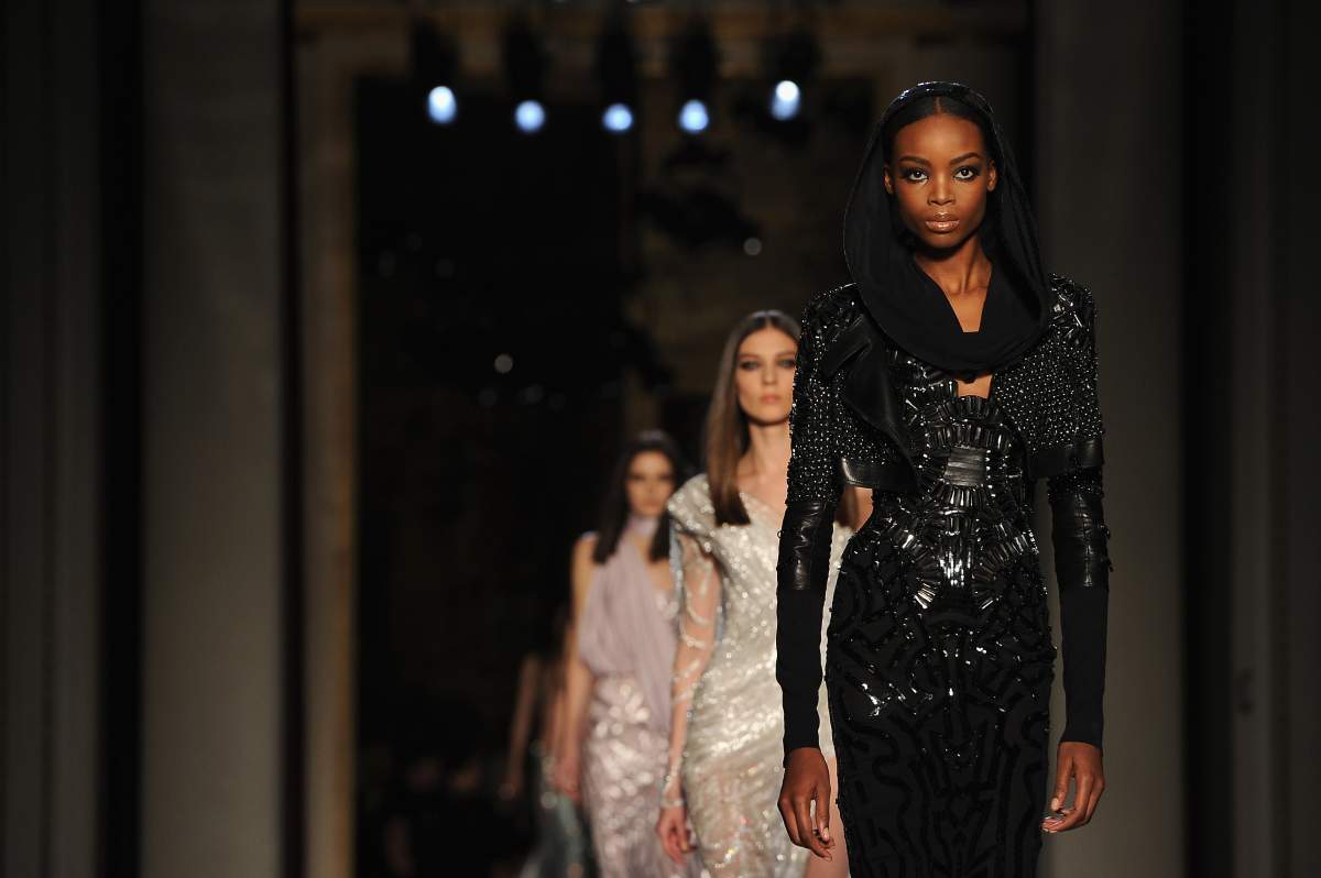 Models walk the runway during Atelier Versace show as part of Paris Fashion Week Haute-Couture Spring/Summer 2014 on January 19, 2014 in Paris, France. (Photo by Pascal Le Segretain/Getty Images)