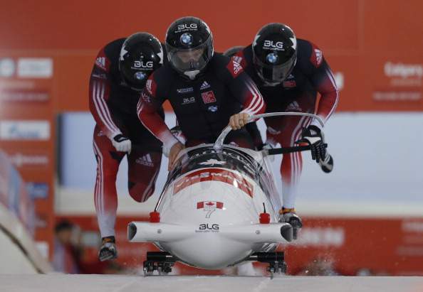 Lyndon Rush, David Bissett, Neville Wright and Lascelles Brown of Canada compete in the men's four man bobsleigh first run during the 2013 IBSF World Cup race November 30, 2013 in Calgary, Alberta, Canada.