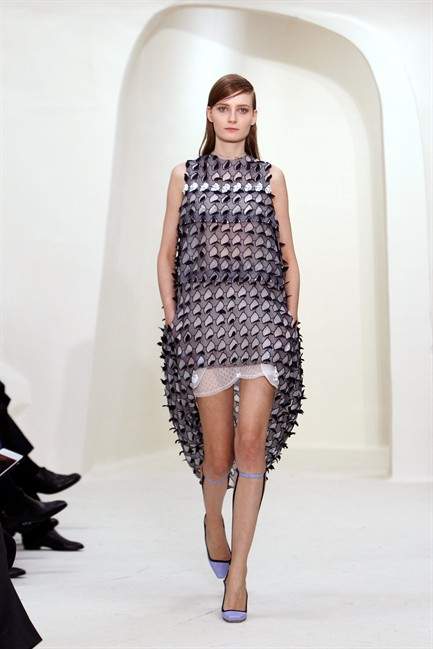 A model presents a creation as part of the Dior Spring-Summer 2014 Haute Couture fashion collection, presented Monday, Jan. 20, 2014 in Paris.